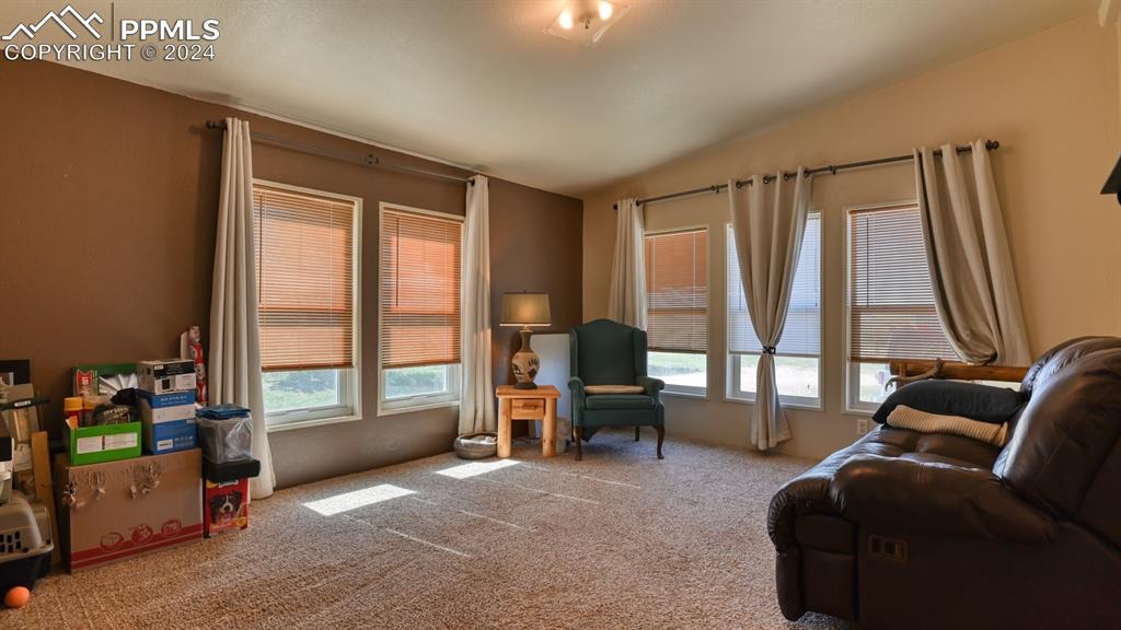 34475 East Jones Road Yoder, CO 80864 - Photo 16 of 31 a living room with furniture and a large window