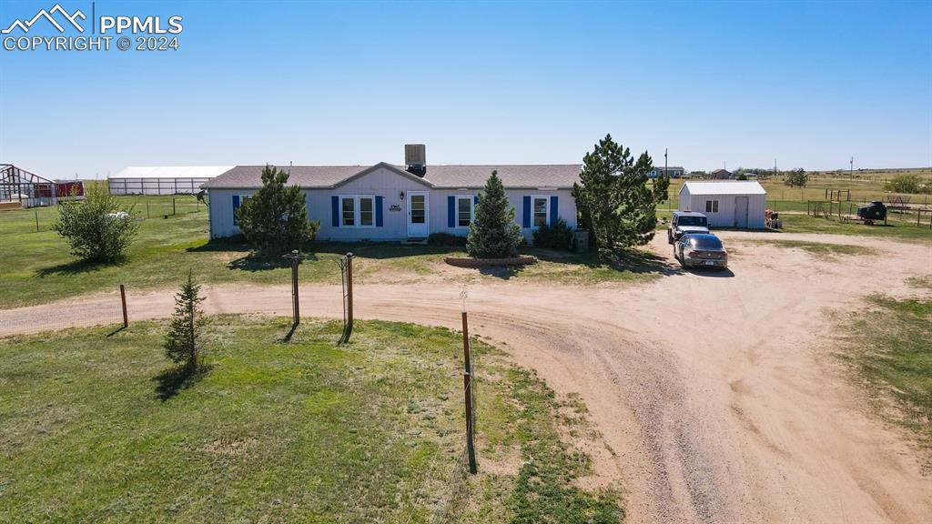 34475 East Jones Road Yoder, CO 80864 - Photo 27 of 31 a view of a house with a yard