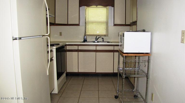 6820 Brandemere Road South Jacksonville, FL 32211 - Photo 4 of 12 a utility room with a sink dryer and washer
