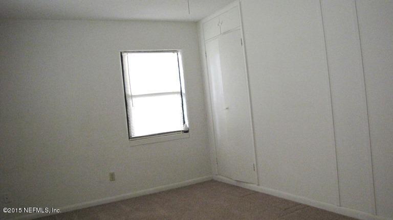 6820 Brandemere Road South Jacksonville, FL 32211 - Photo 7 of 12 an empty room with a window