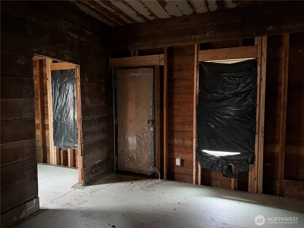 a view of an empty room and window