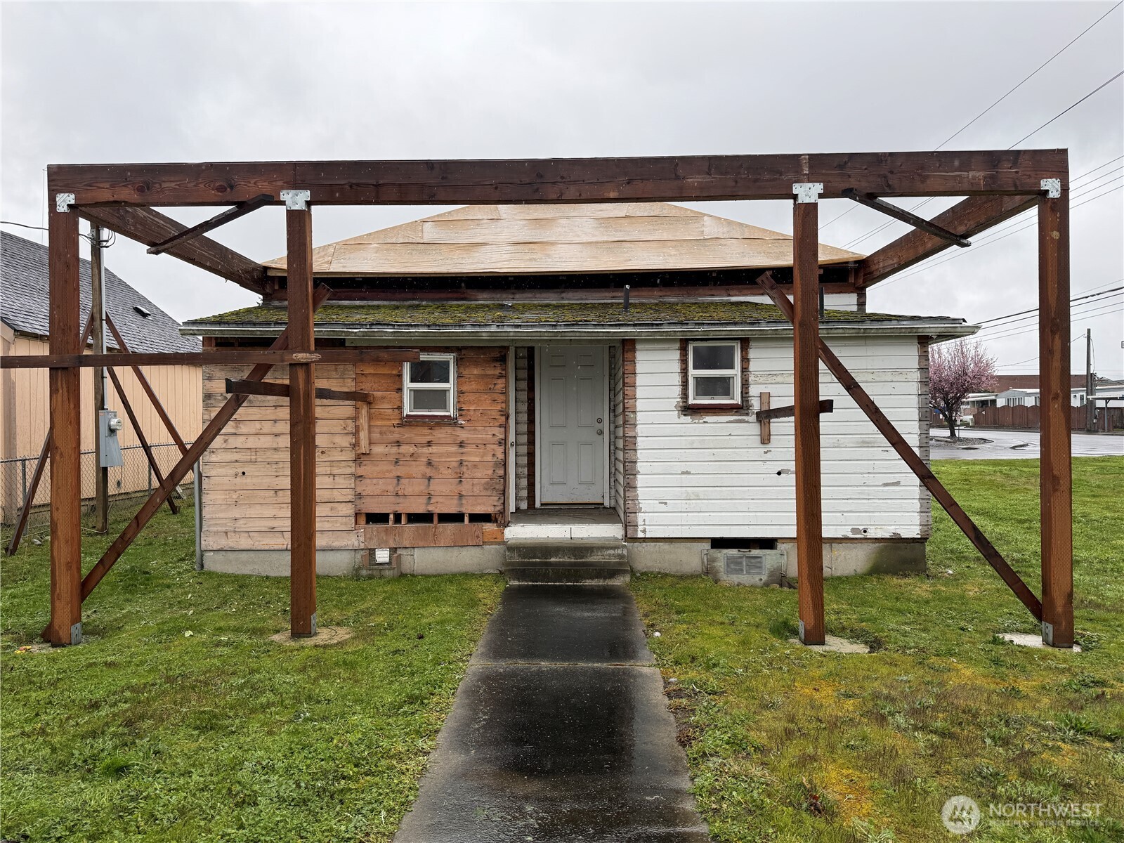 490 West Spruce Street Sequim, WA 98382 - Photo 13 of 18 a view of house with a yard