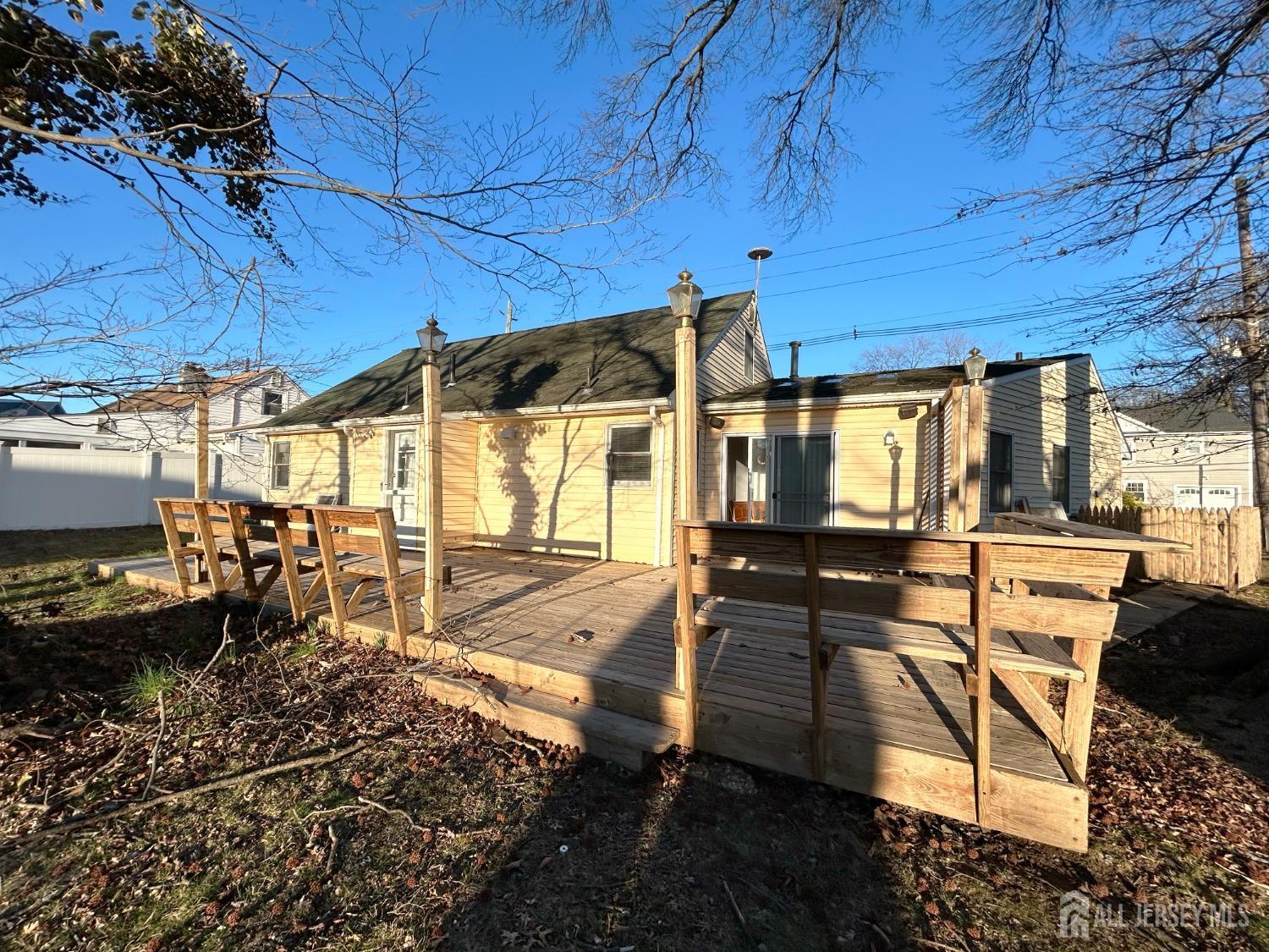 122 Vineyard Road Edison, NJ 08817 - Photo 3 of 19 a view of a backyard with wooden floor