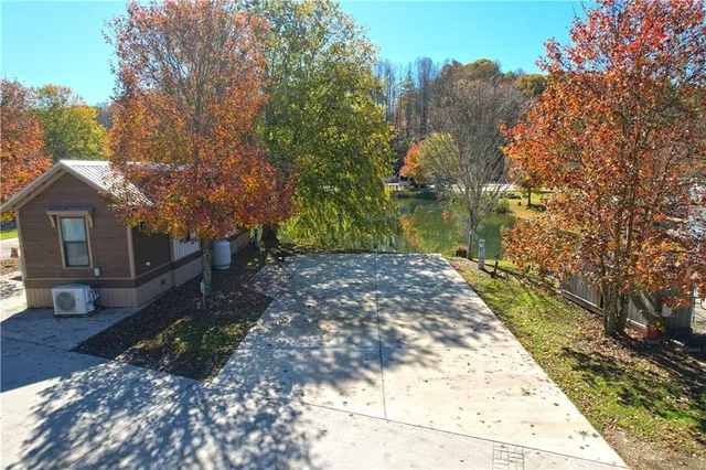 a backyard of a house with lots of green space