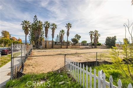 405 West Merrill Avenue Rialto, CA 92376 - Photo 9 of 20 a view of swimming pool with outdoor seating and plants