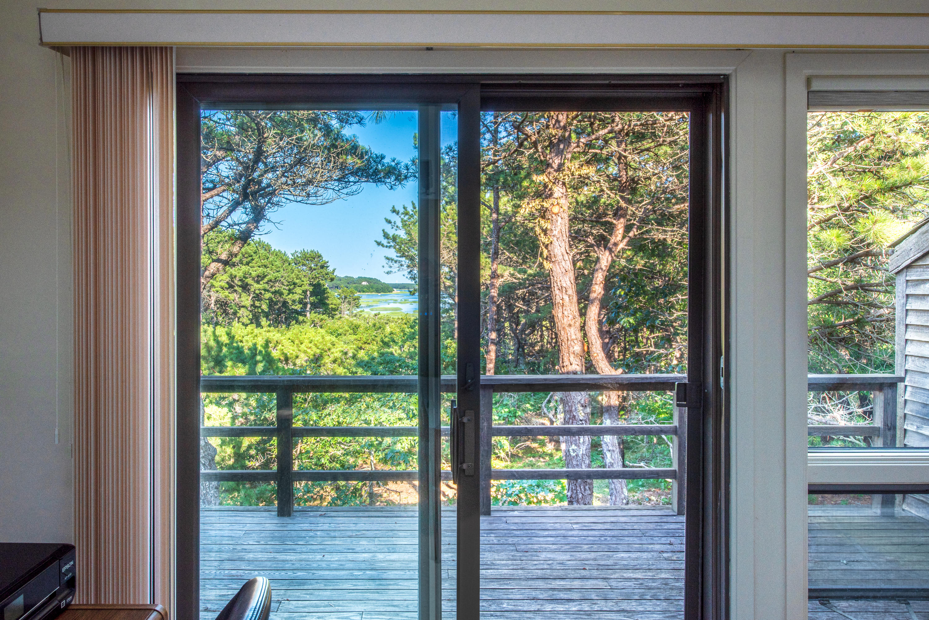 245 King Phillip Road Wellfleet, MA 02667 - Photo 17 of 33 a view of a room that has a large window