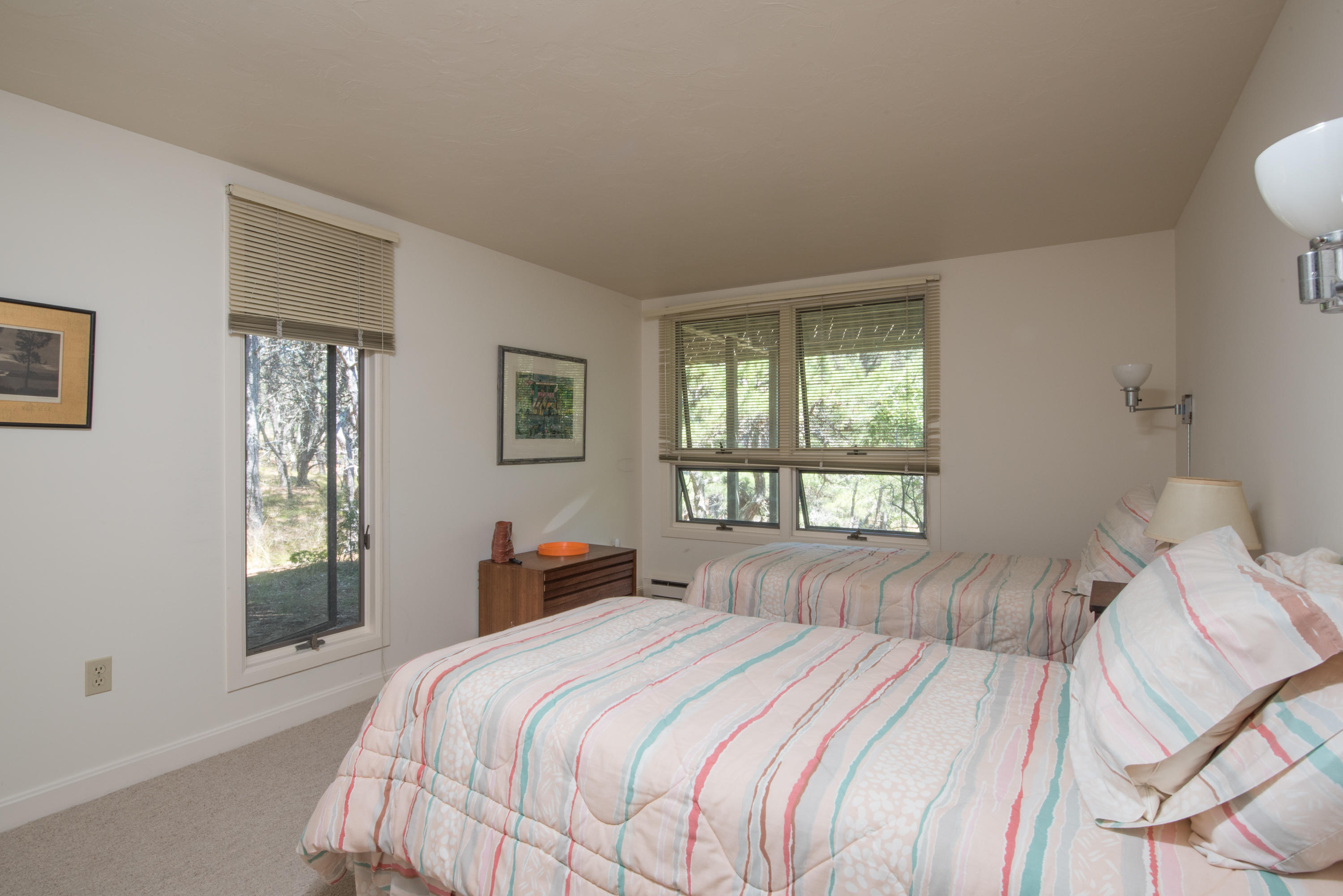 245 King Phillip Road Wellfleet, MA 02667 - Photo 21 of 33 a bedroom with a bed and a window