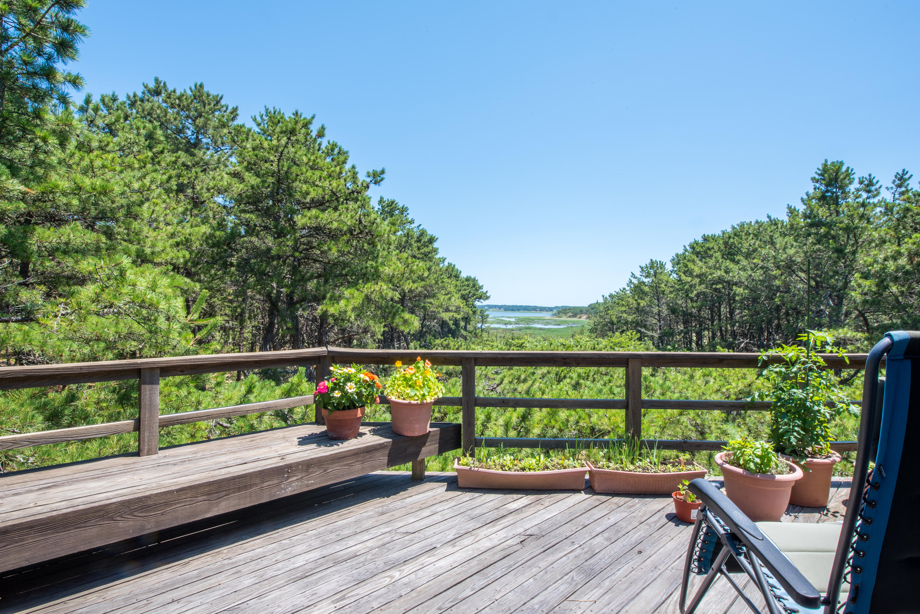 245 King Phillip Road Wellfleet, MA 02667 - Photo 32 of 33 a view of balcony with furniture and wooden floor