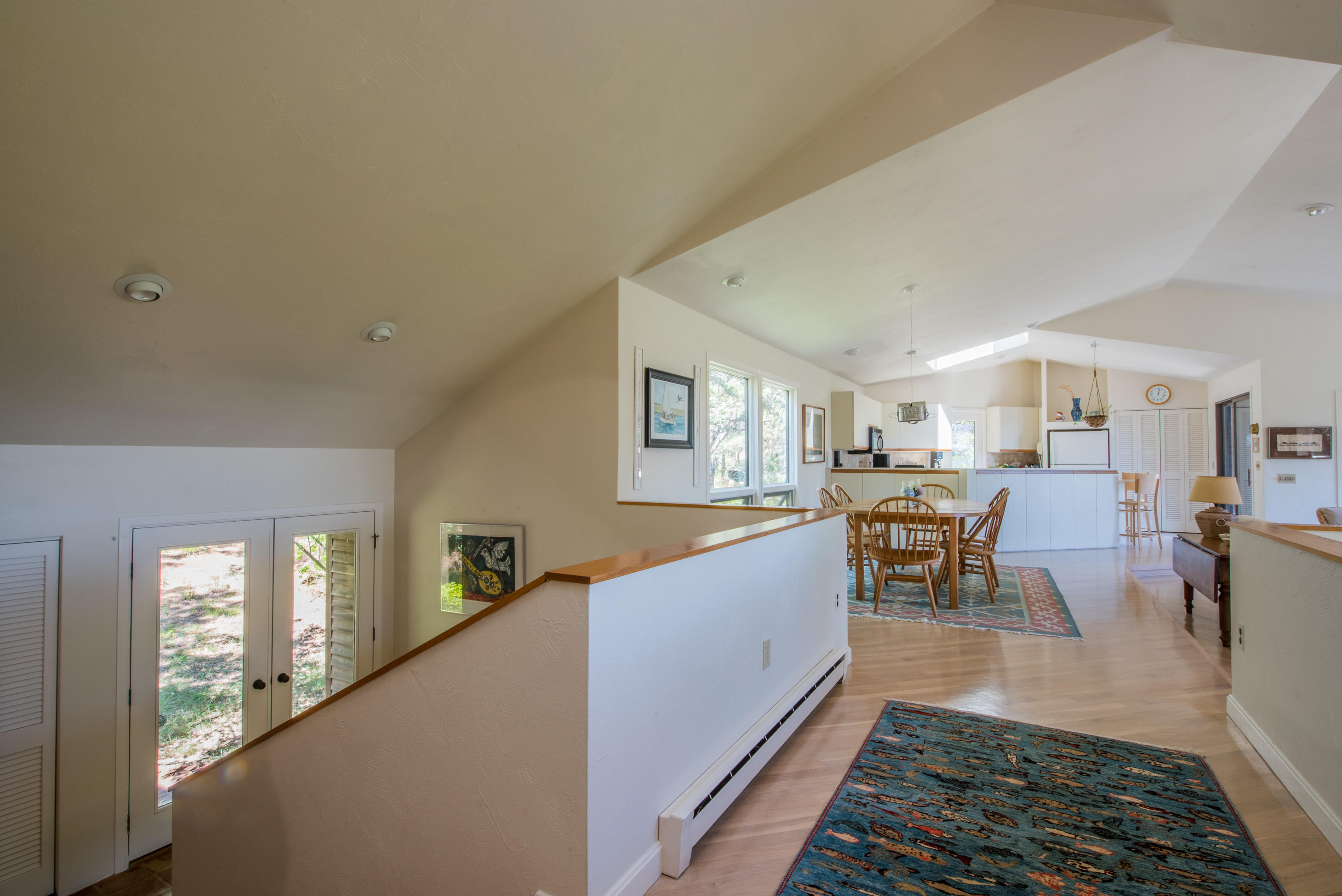 245 King Phillip Road Wellfleet, MA 02667 - Photo 8 of 33 a living room with furniture and a rug
