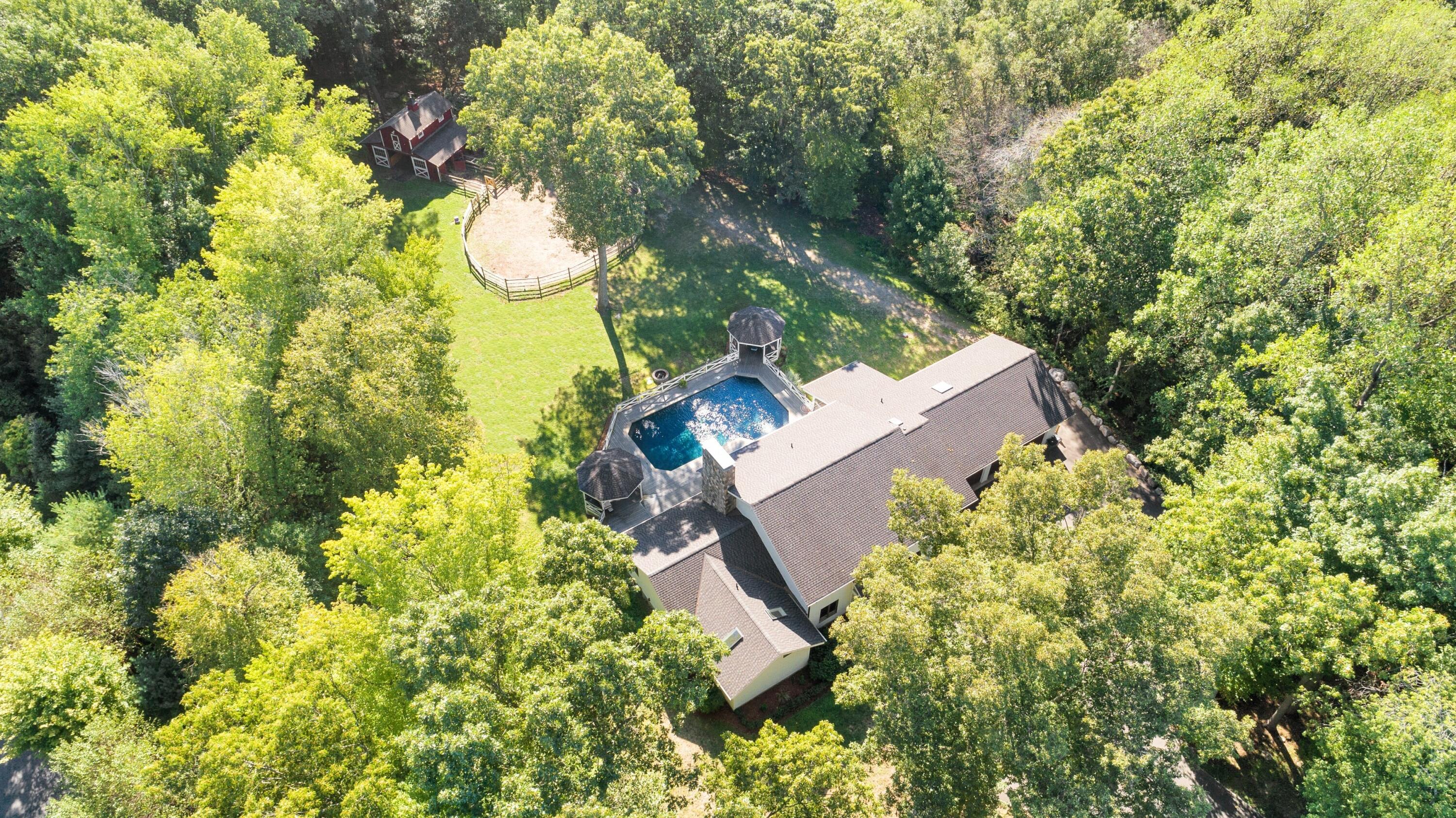 30 Carrington Drive Greenwich, CT 06831 - Photo 1 of 46 view of a house with a yard and garden