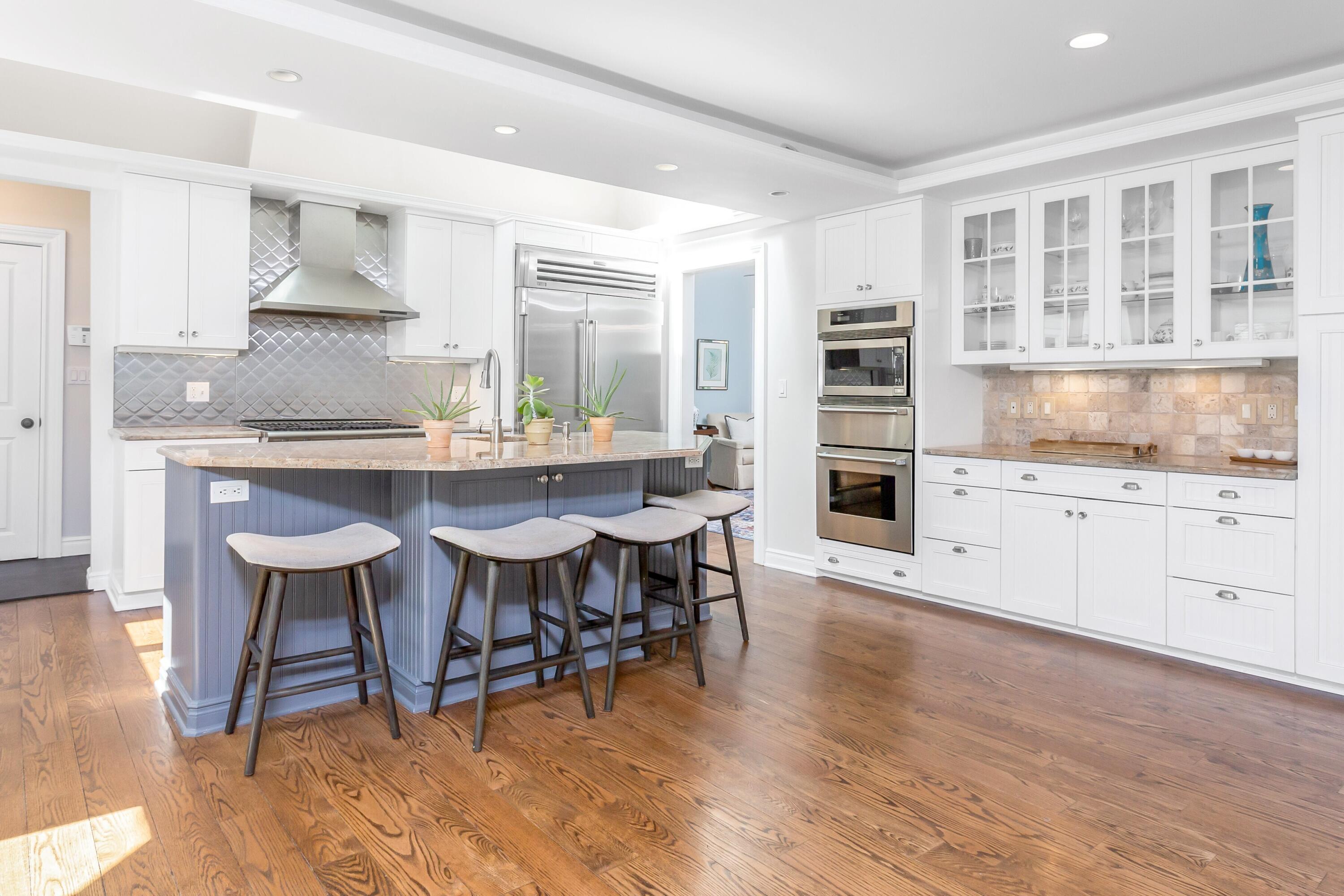 30 Carrington Drive Greenwich, CT 06831 - Photo 11 of 46 a view of kitchen with dining table chairs and wooden floor