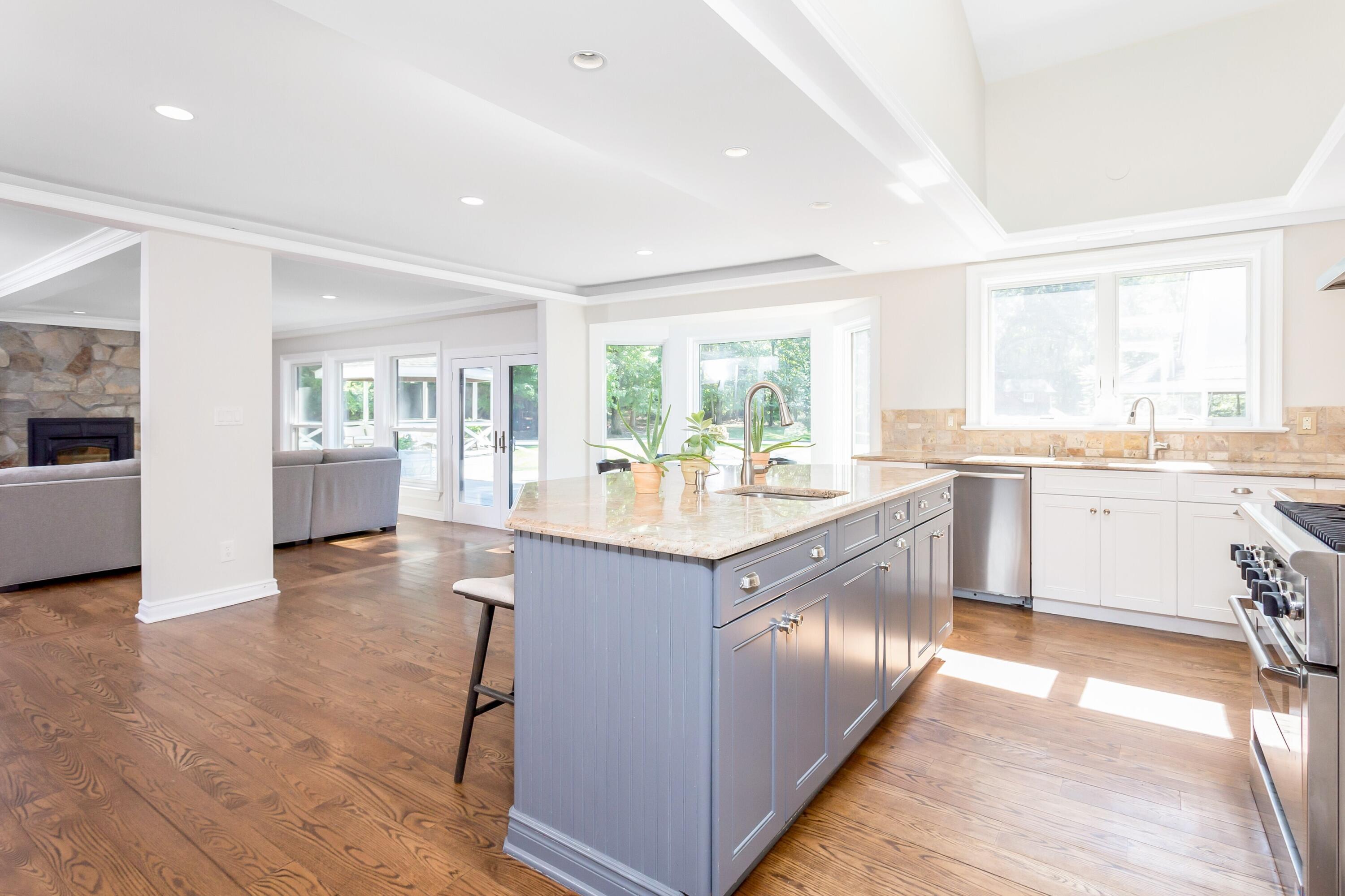 30 Carrington Drive Greenwich, CT 06831 - Photo 12 of 46 a kitchen with stainless steel appliances granite countertop a sink and cabinets