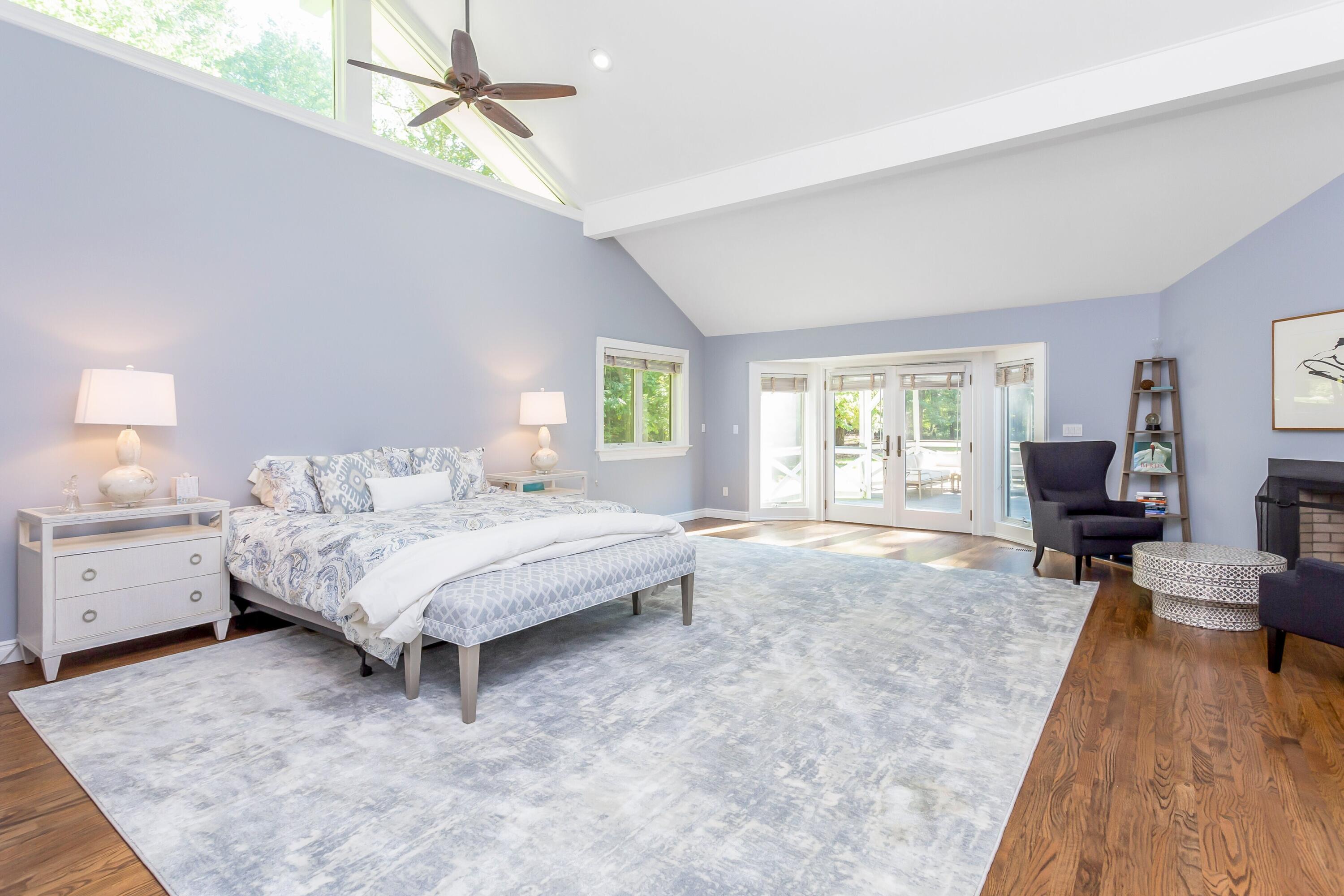 30 Carrington Drive Greenwich, CT 06831 - Photo 19 of 46 a spacious bedroom with a bed a table and chair