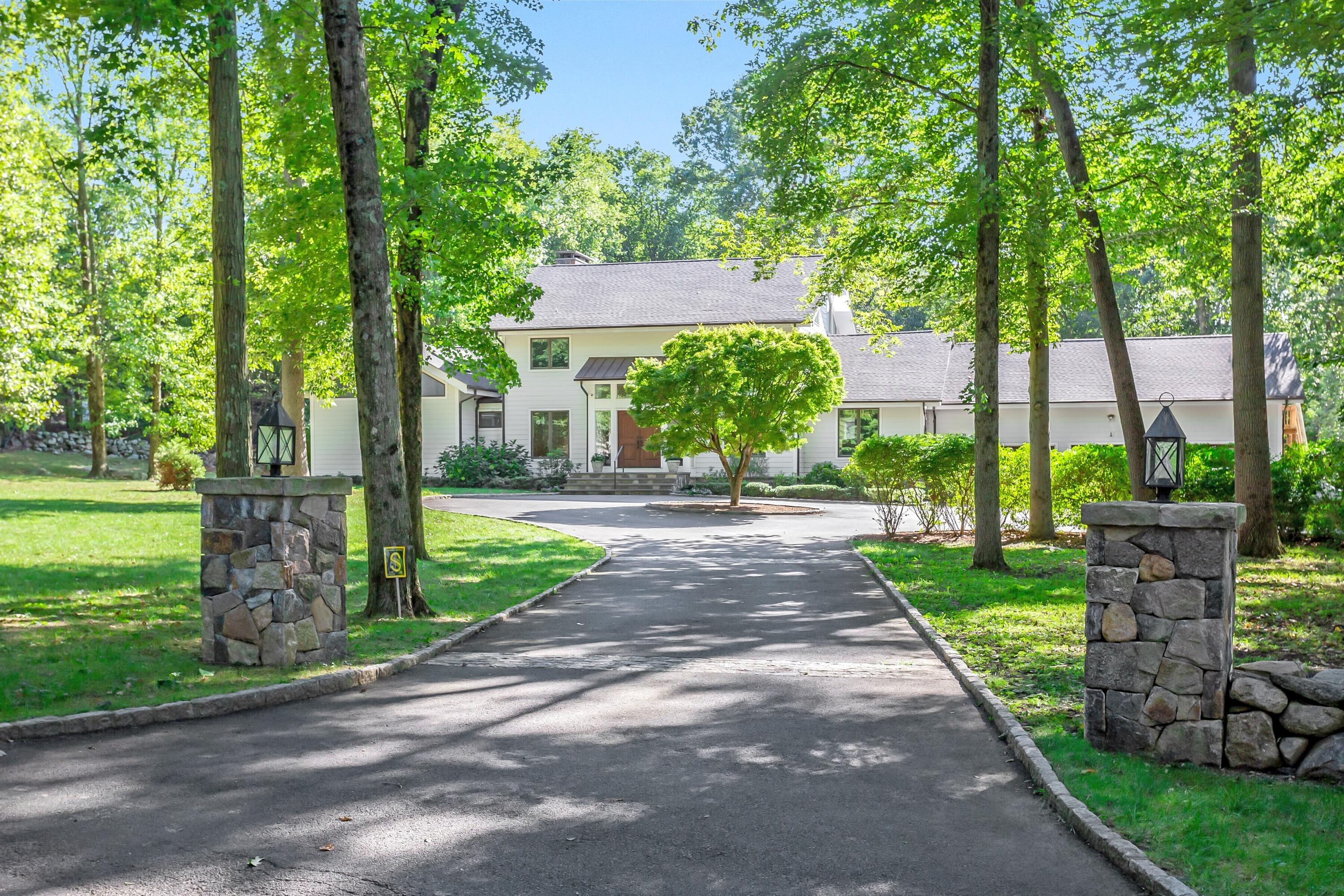 30 Carrington Drive Greenwich, CT 06831 - Photo 2 of 46 a view of a house with a garden