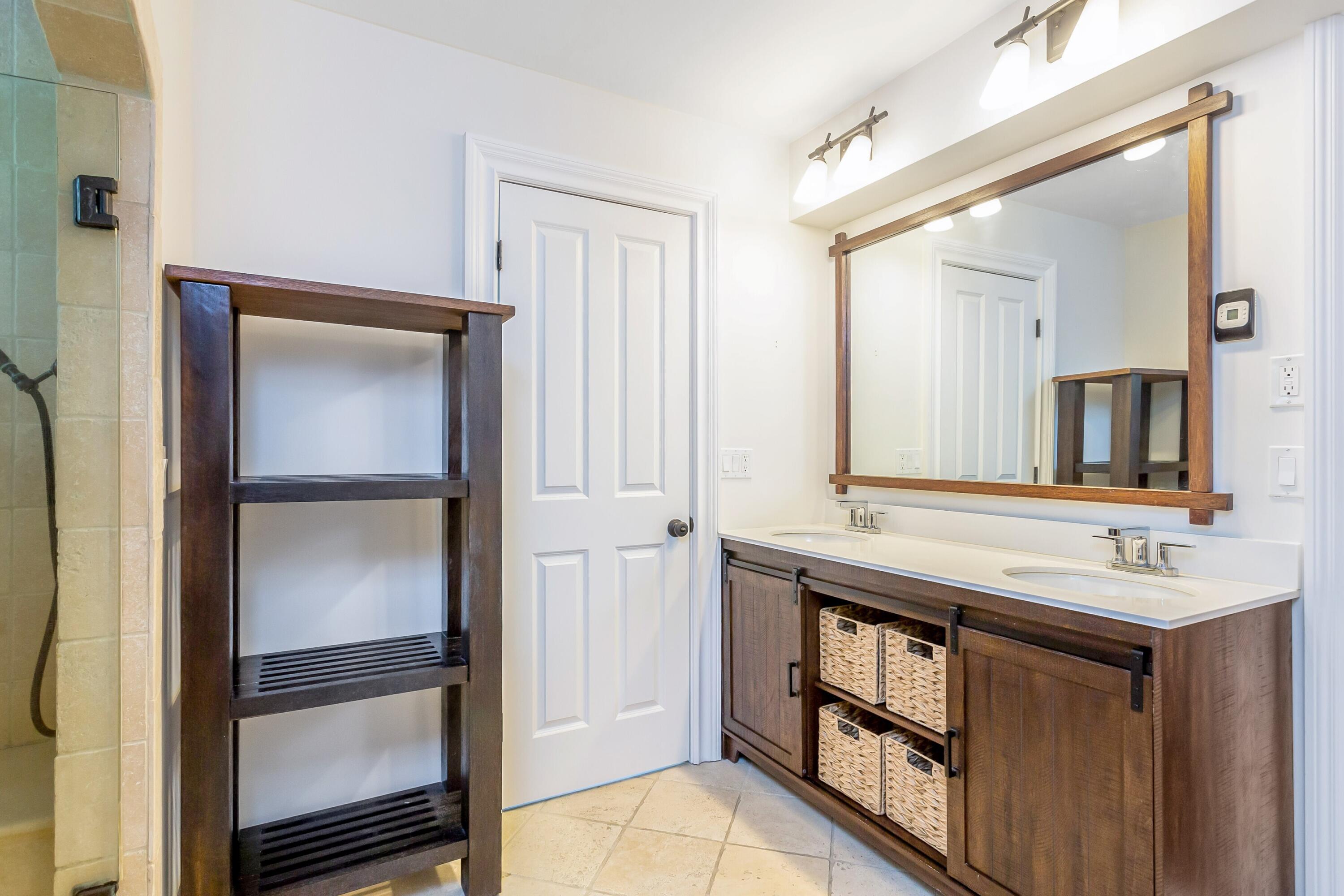 30 Carrington Drive Greenwich, CT 06831 - Photo 28 of 46 a bathroom with a sink and a mirror