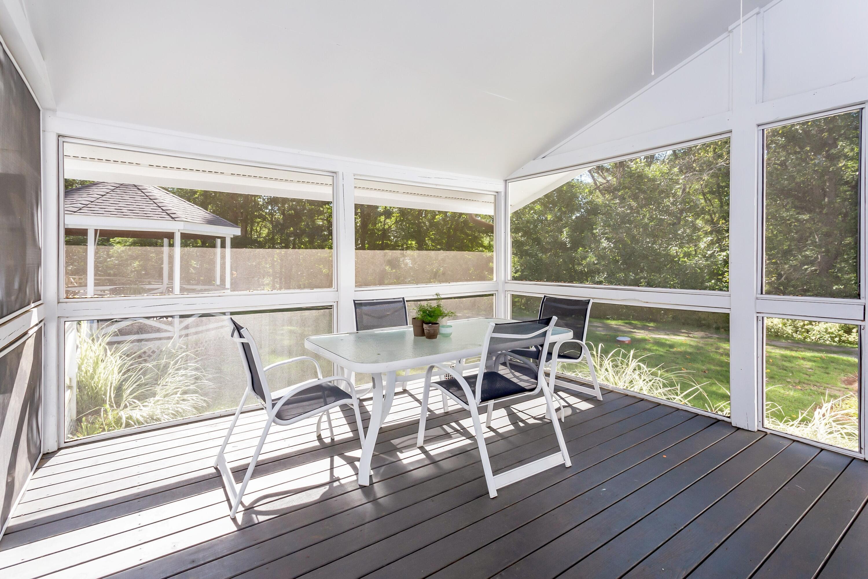 30 Carrington Drive Greenwich, CT 06831 - Photo 35 of 46 a view of a dining room with furniture window and wooden floor
