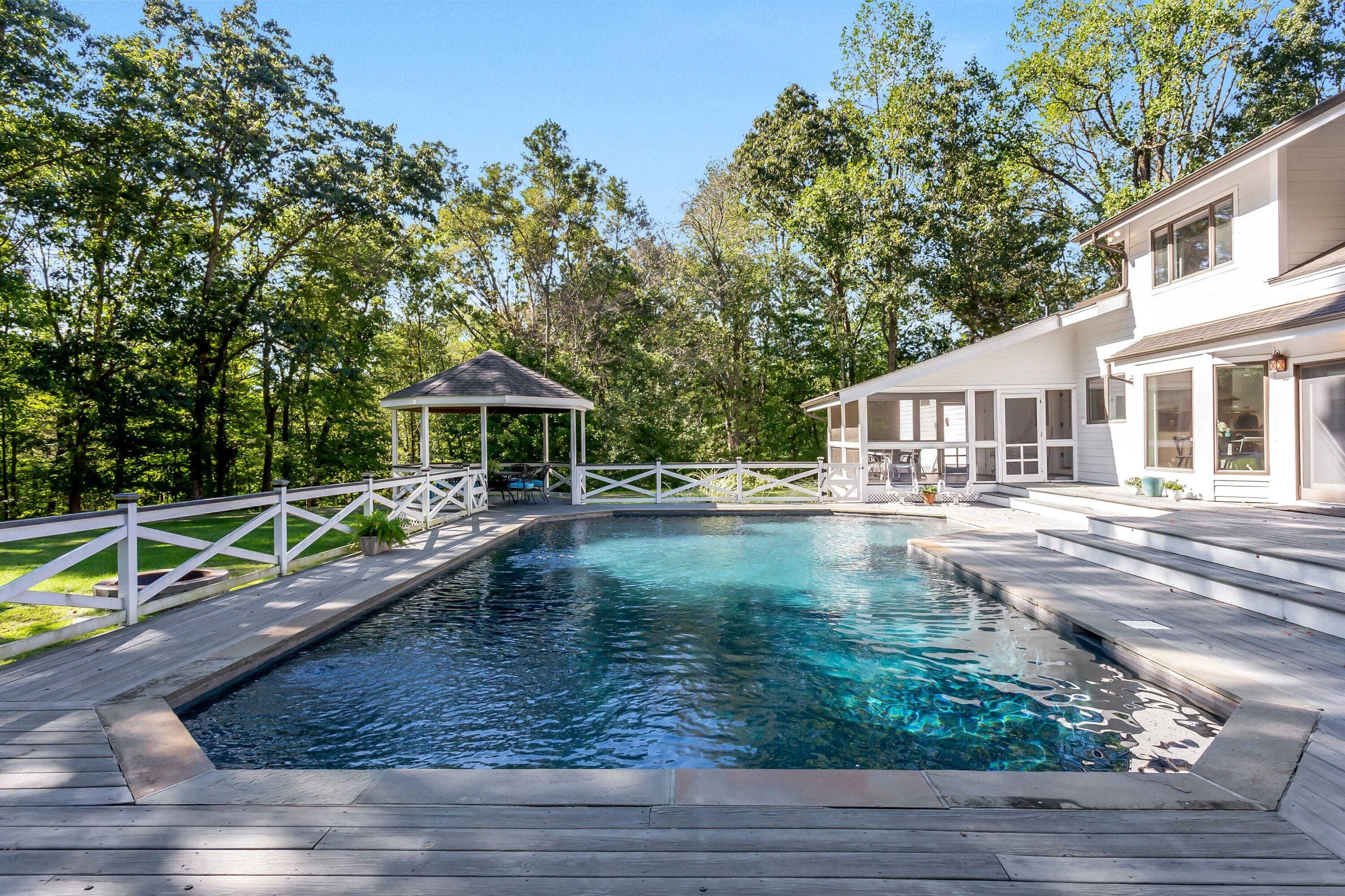 30 Carrington Drive Greenwich, CT 06831 - Photo 36 of 46 a view of pool with small yard and large trees