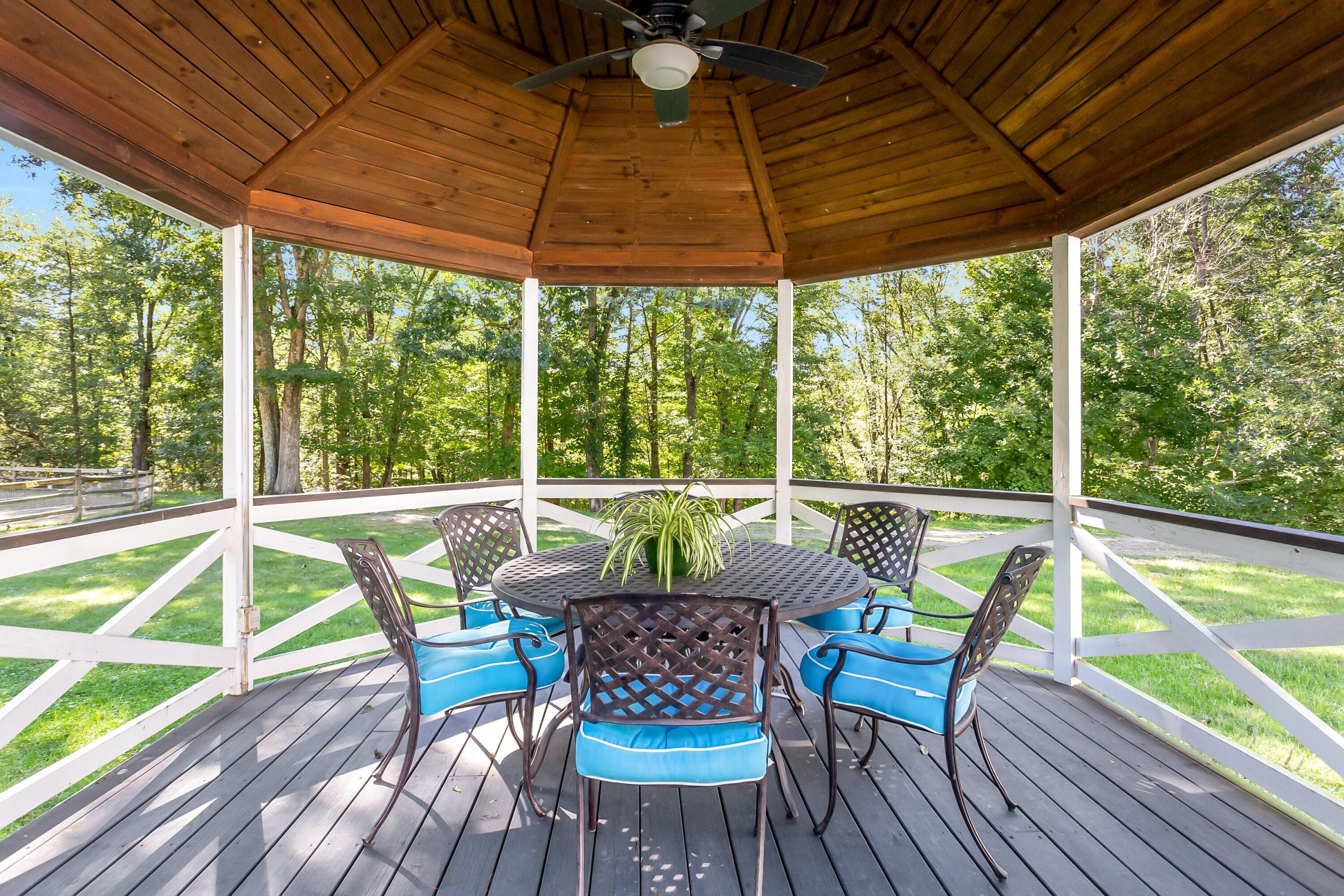 30 Carrington Drive Greenwich, CT 06831 - Photo 37 of 46 a view of back yard with porch and outdoor seating