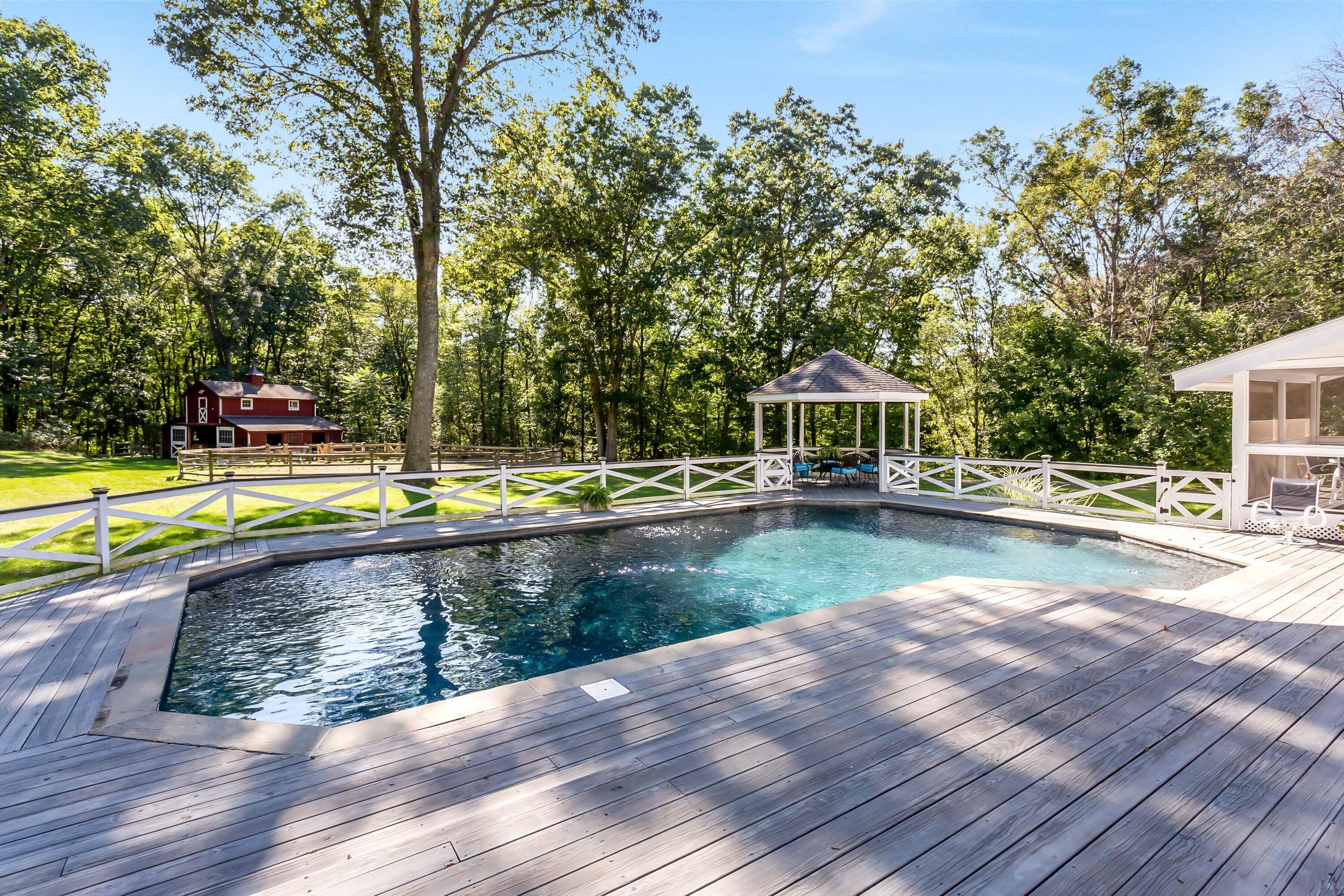 30 Carrington Drive Greenwich, CT 06831 - Photo 4 of 46 a view of swimming pool with sitting area and seating area