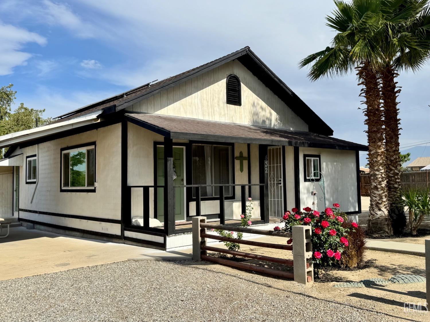 Undisclosed Address Maricopa, CA 93252 - Photo 1 of 33 a front view of a house with a porch