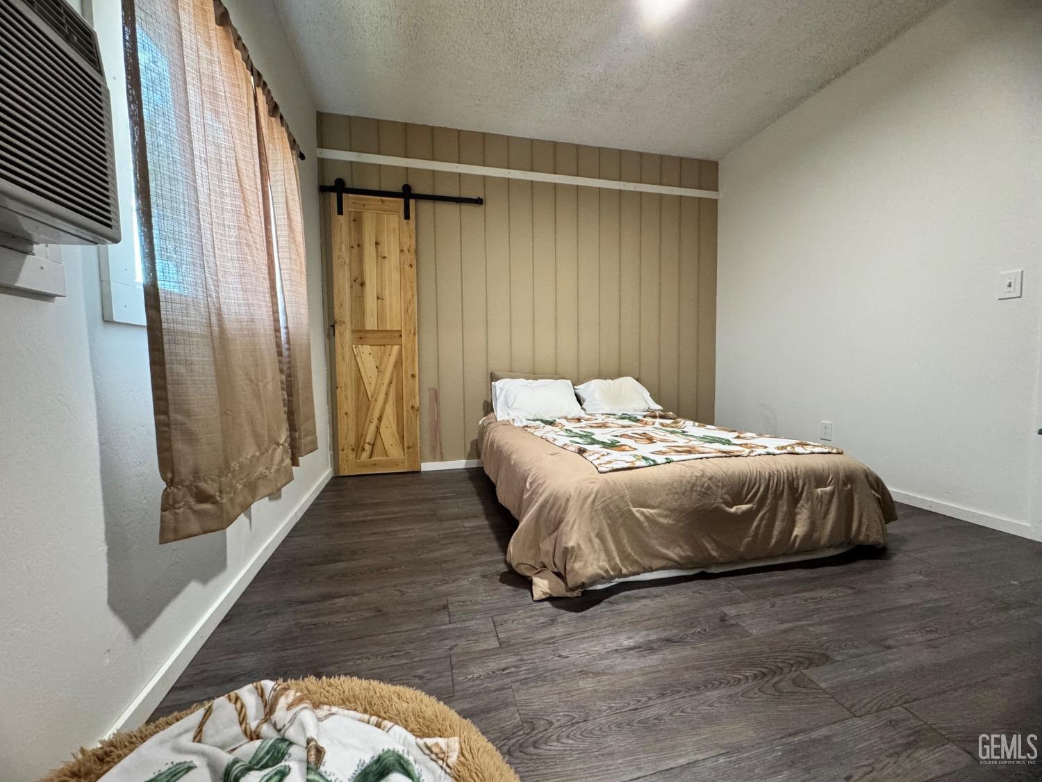 Undisclosed Address Maricopa, CA 93252 - Photo 16 of 33 a bedroom with a bed and a window