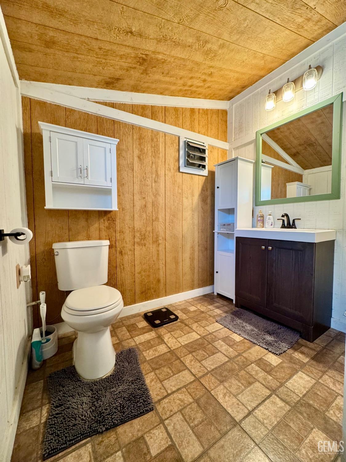 Undisclosed Address Maricopa, CA 93252 - Photo 22 of 33 a bathroom with a toilet sink and mirror