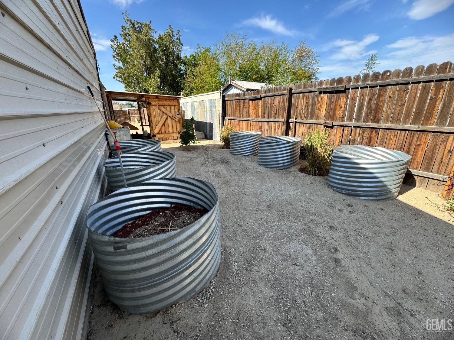 Undisclosed Address Maricopa, CA 93252 - Photo 31 of 33 a balcony with view of city view and wooden floor