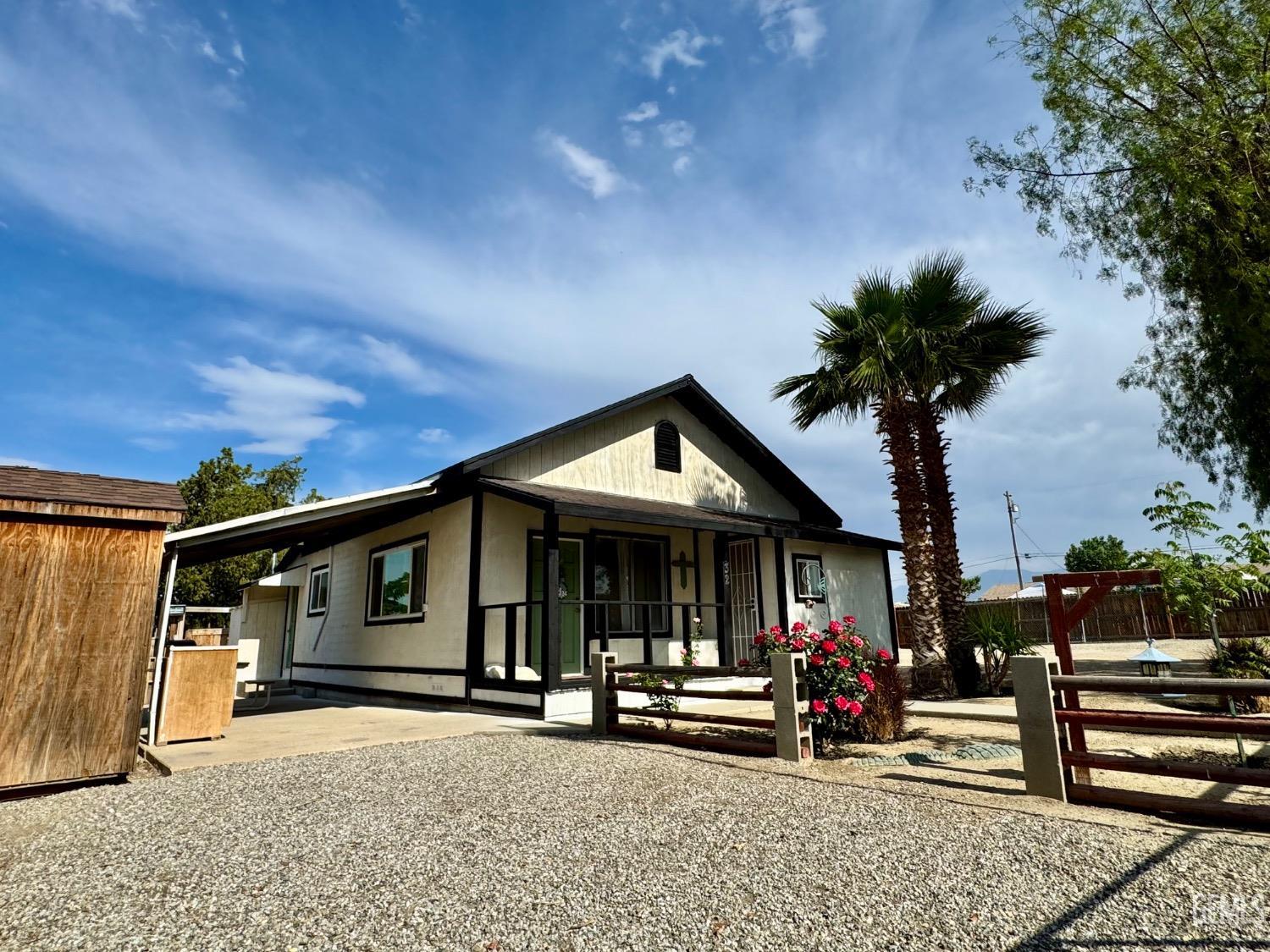 Undisclosed Address Maricopa, CA 93252 - Photo 4 of 33 a view of a house with porch and chairs