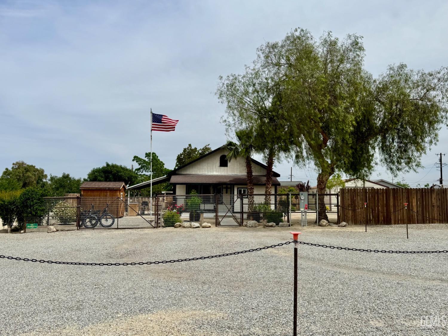 Undisclosed Address Maricopa, CA 93252 - Photo 7 of 33 a front view of a building with street