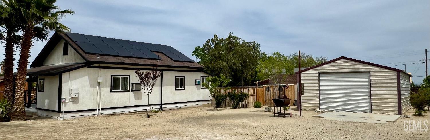 Undisclosed Address Maricopa, CA 93252 - Photo 8 of 33 a view of a house with wooden fence