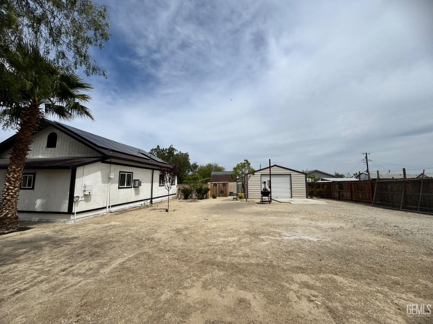 Undisclosed Address Maricopa, CA 93252 - Photo 9 of 33 a big house with a large tree in front of it