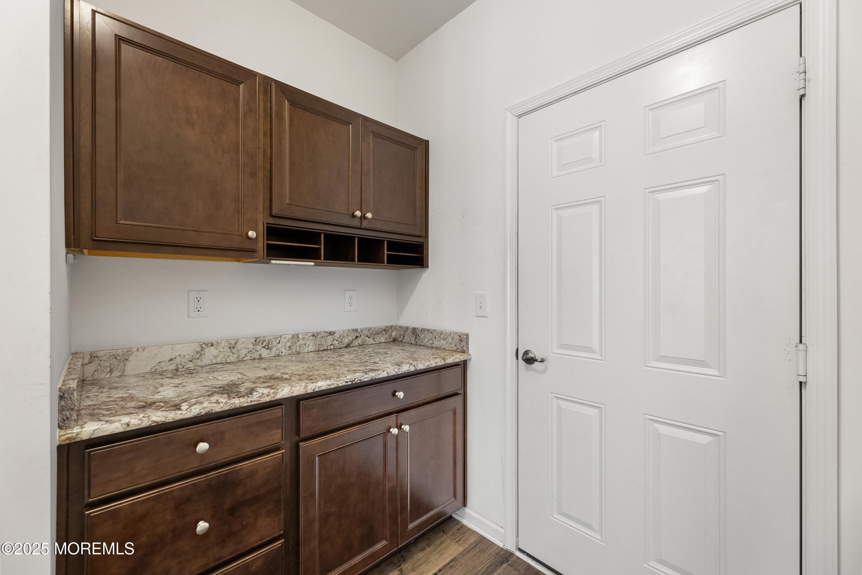 58 Harvest Ridge Road Howell, NJ 07731 - Photo 20 of 53 a view of cabinets and wooden floor