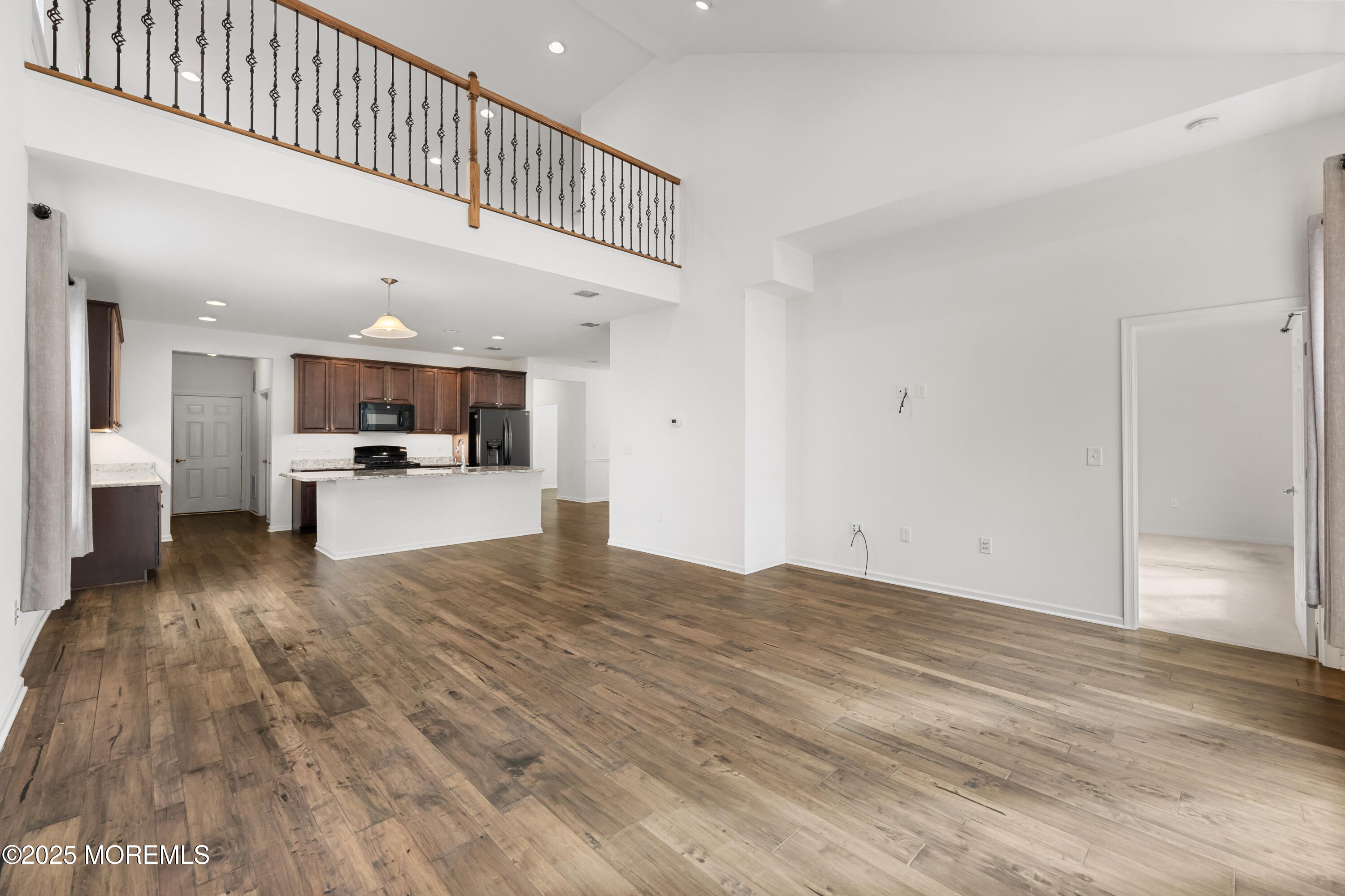 58 Harvest Ridge Road Howell, NJ 07731 - Photo 21 of 53 a view of kitchen with cabinets and wooden floor