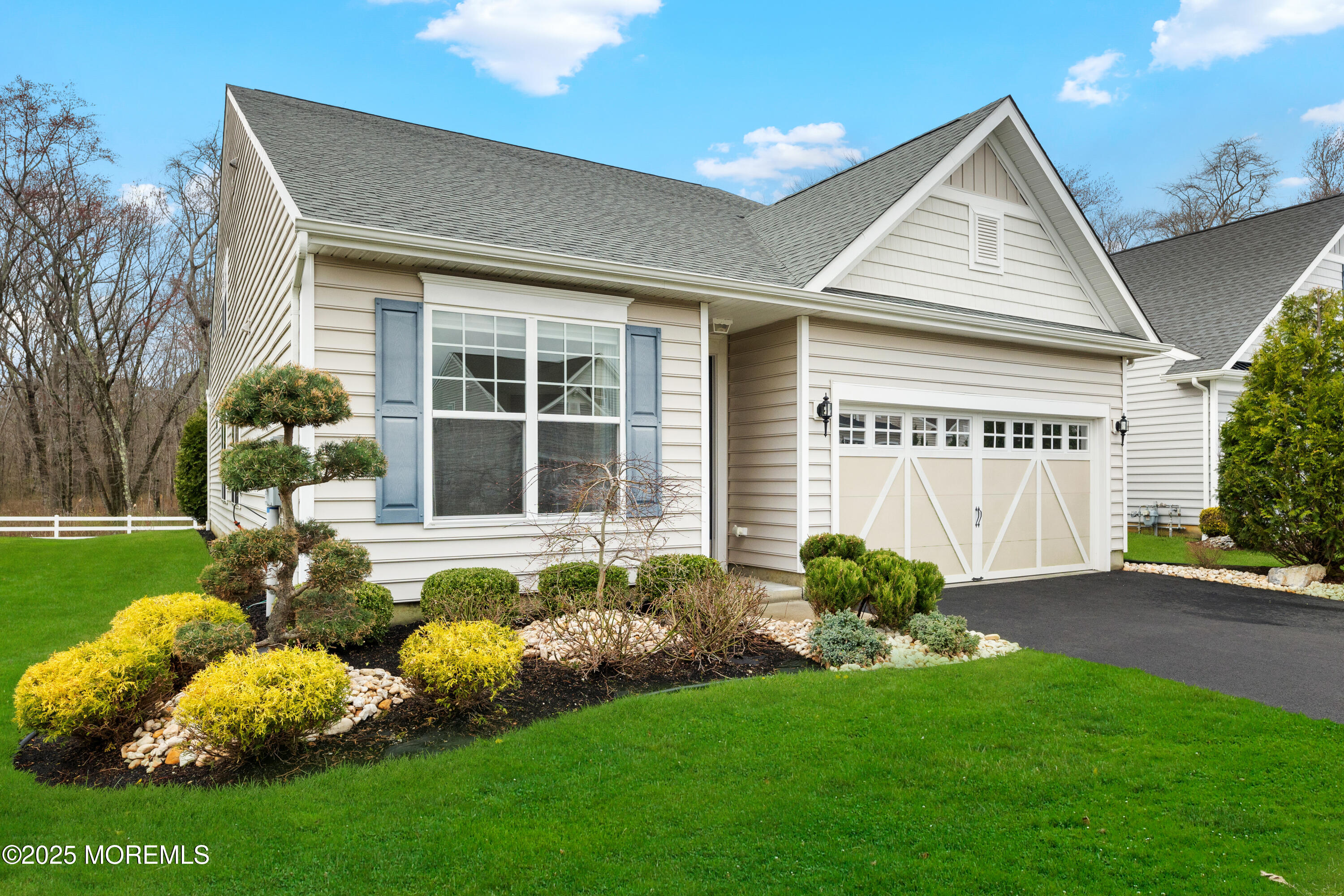 58 Harvest Ridge Road Howell, NJ 07731 - Photo 3 of 53 a front view of a house with garden