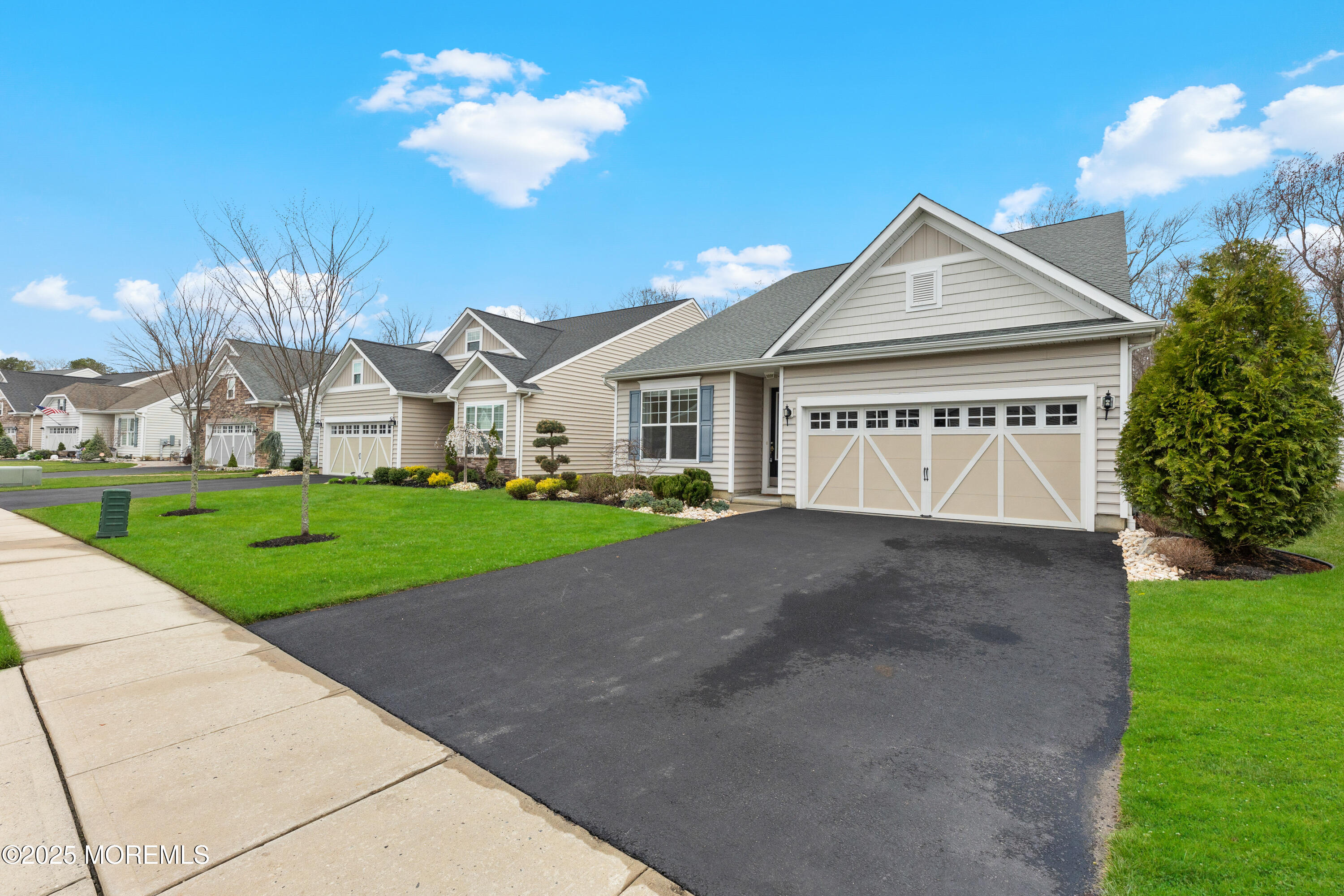 58 Harvest Ridge Road Howell, NJ 07731 - Photo 4 of 53 a view of a big house with a big yard and potted plants