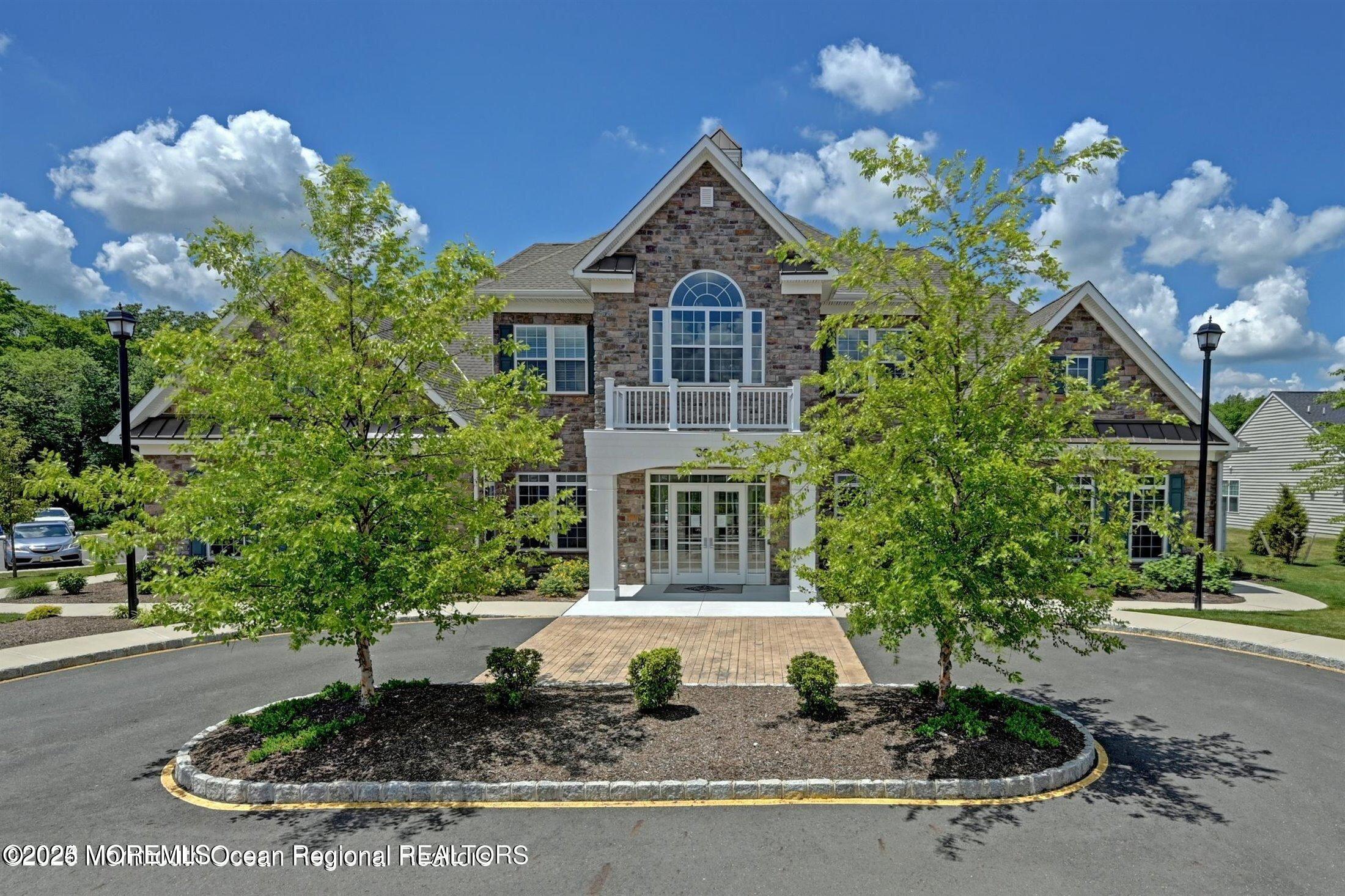 58 Harvest Ridge Road Howell, NJ 07731 - Photo 45 of 53 a front view of a house with a yard