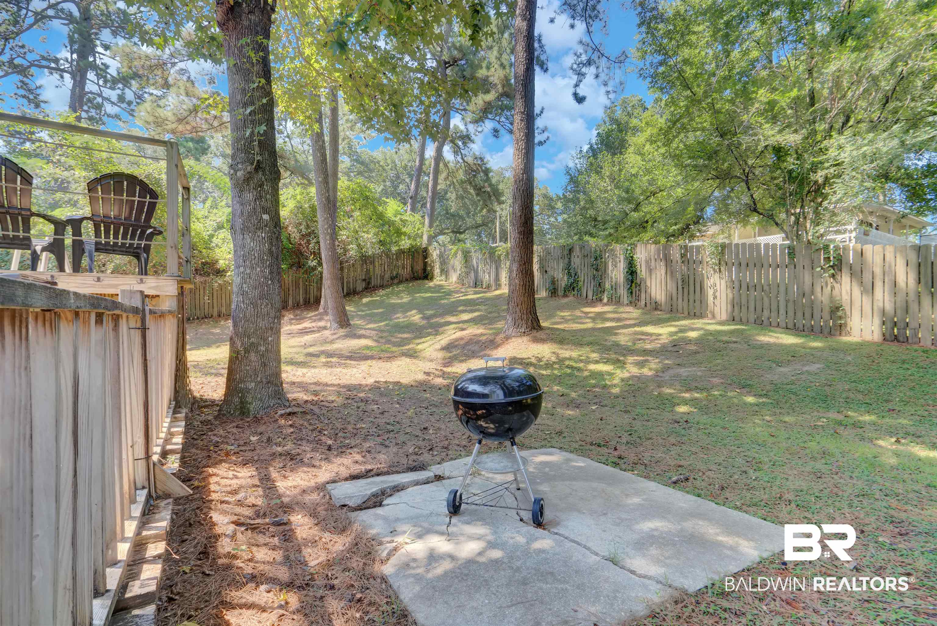 30871 Stanton Road Spanish Fort, AL 36527 - Photo 34 of 35 View of yard with a patio area