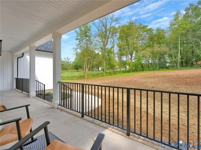 a balcony with wooden floor