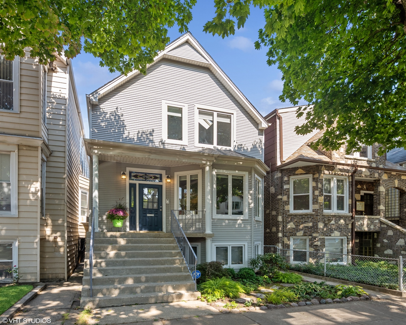 1750 West School Street Chicago, IL 60657 - Photo 1 of 37 a front view of a house with a yard