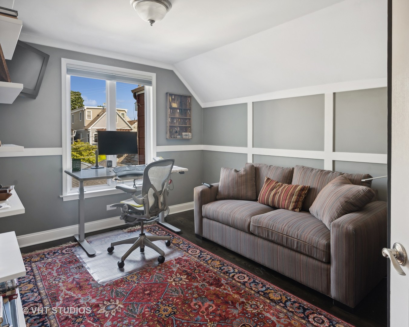 1750 West School Street Chicago, IL 60657 - Photo 18 of 37 a living room with furniture a rug and white walls