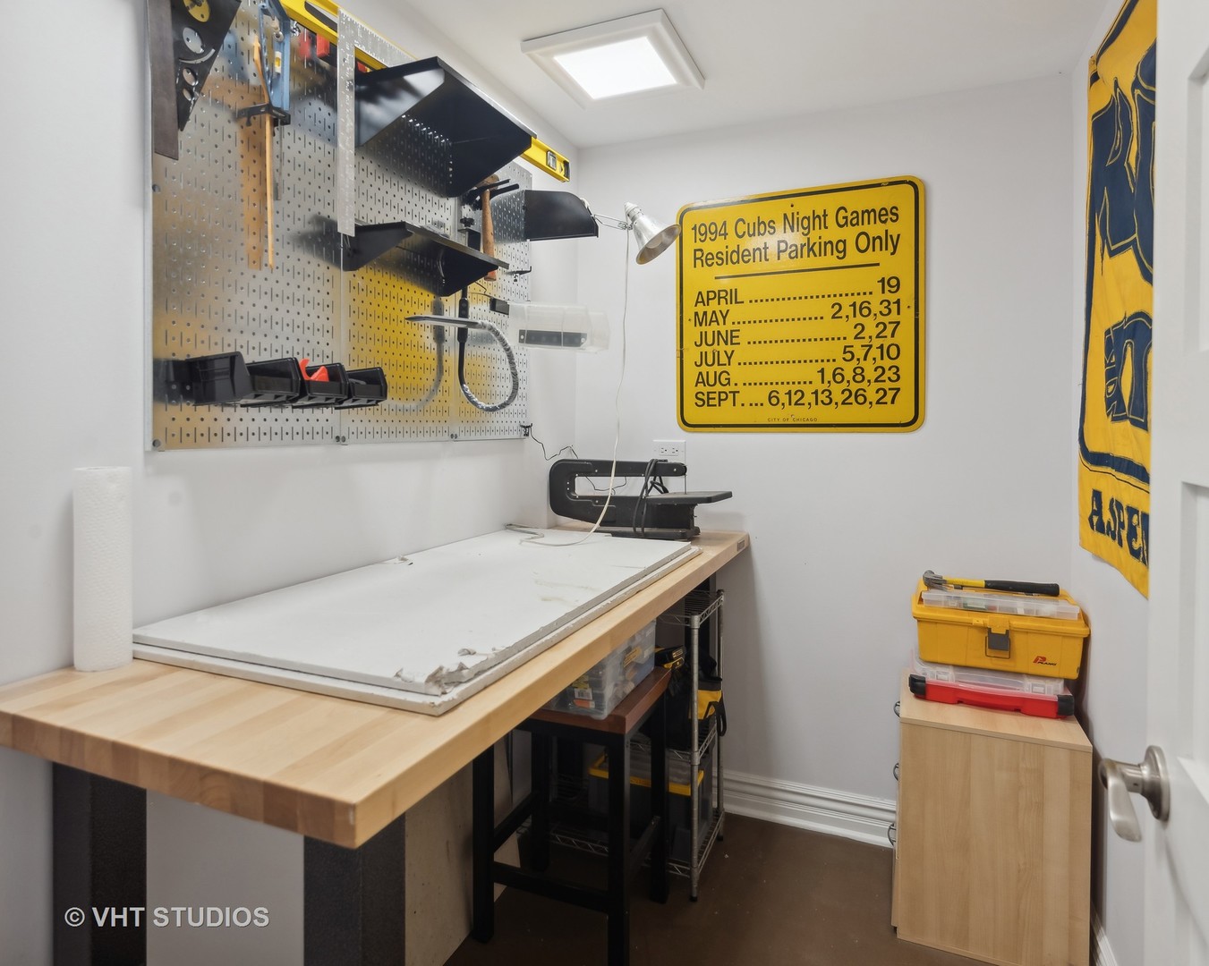 1750 West School Street Chicago, IL 60657 - Photo 24 of 37 a utility room with a table and chairs