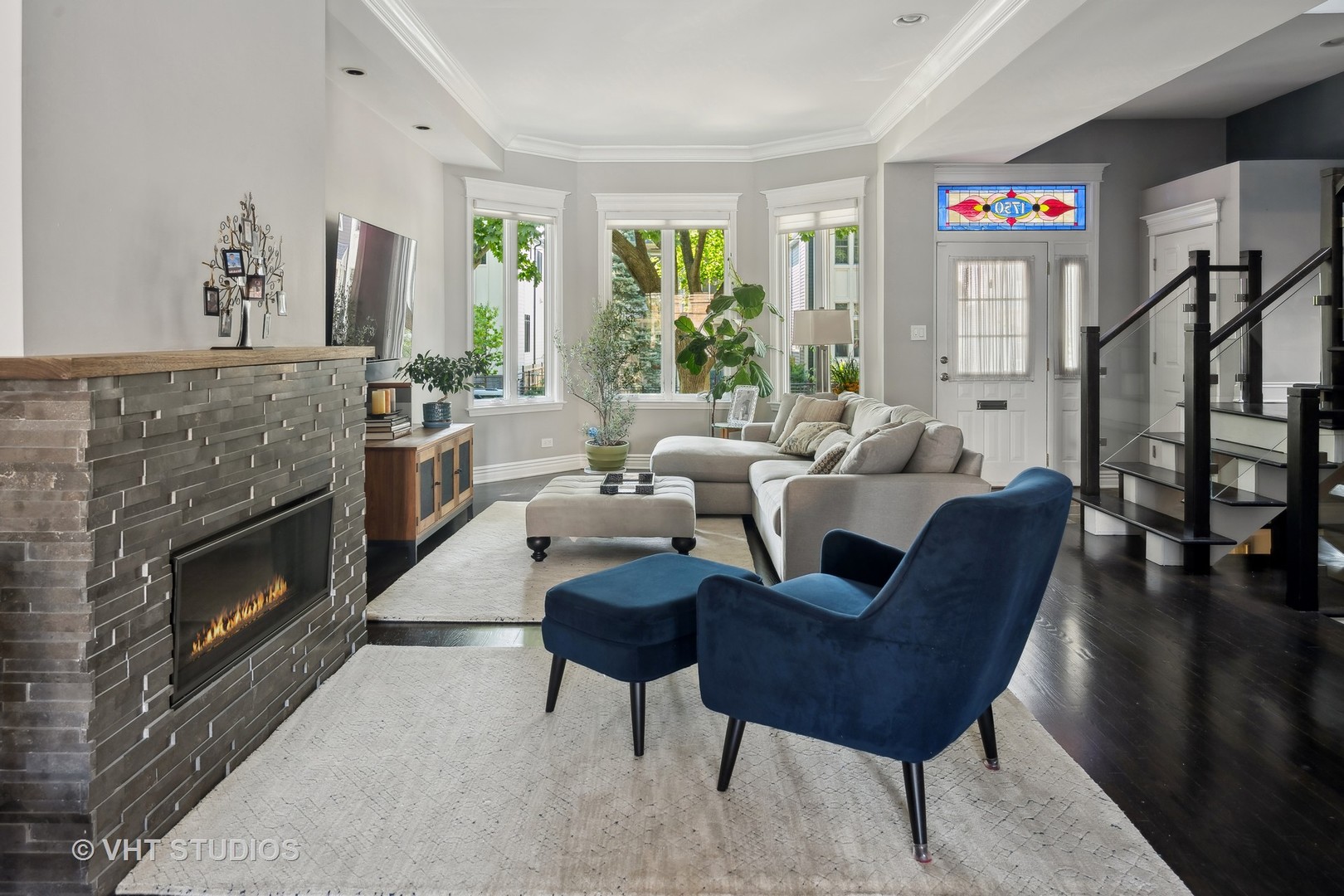 1750 West School Street Chicago, IL 60657 - Photo 9 of 37 a living room with furniture and a fireplace