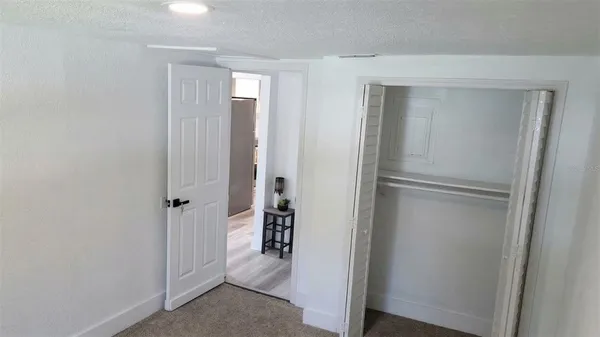 a view of a livingroom from a hallway