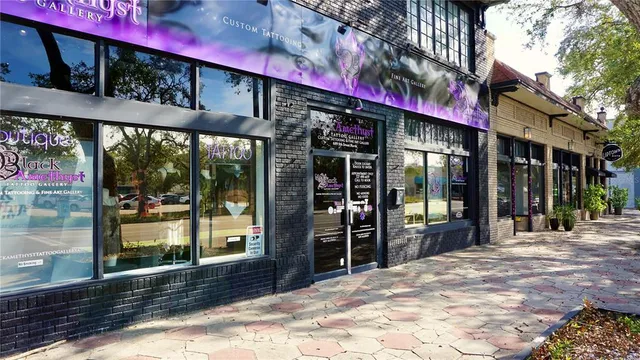 a view of street with parked cars