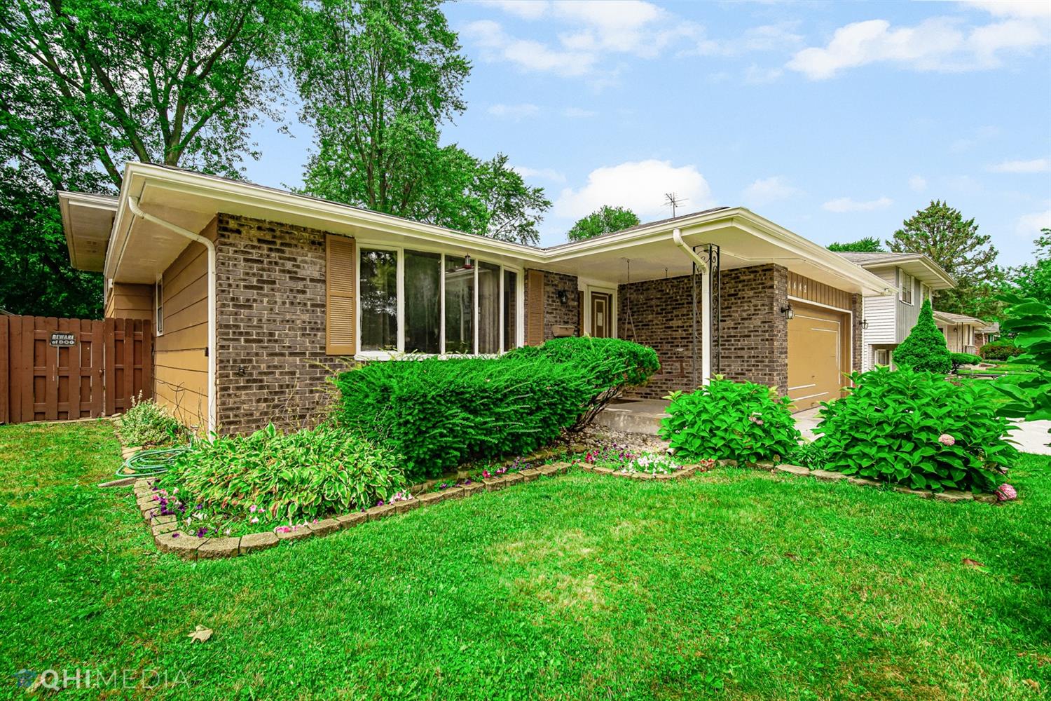 1442 Swift Street Hobart, IN 46342 - Photo 1 of 1 a front view of a house with a yard