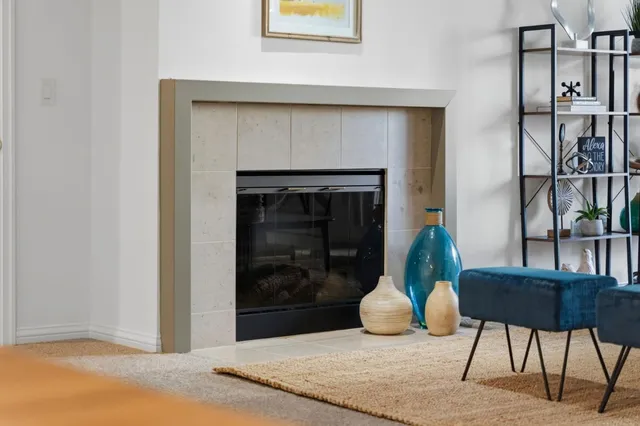a view of a livingroom with furniture and entryway