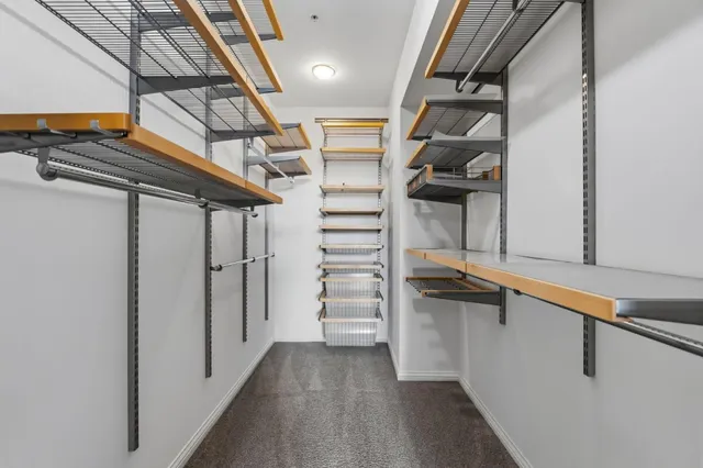 a view of a brick building with many windows