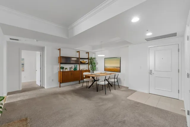 a view of a livingroom with furniture and window