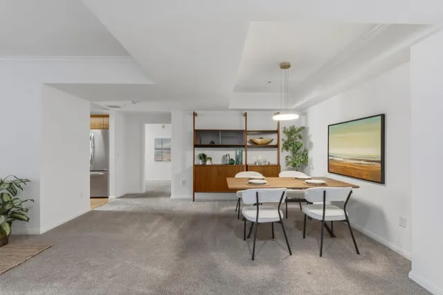 a view of a livingroom with furniture and window