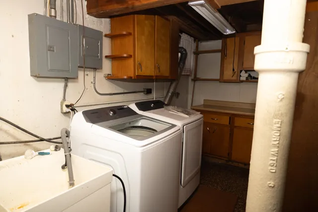 a utility room with dryer and washer